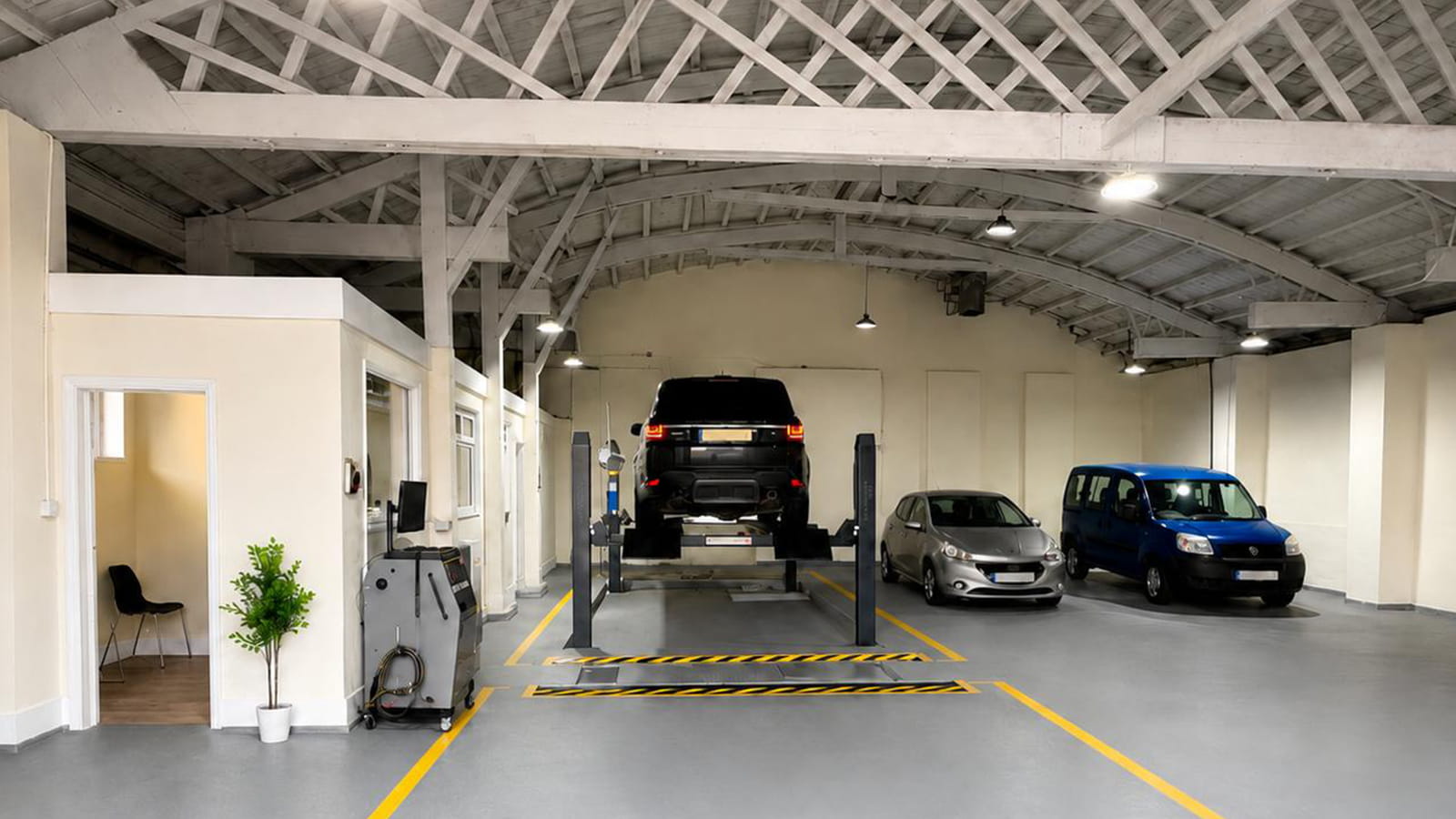 Technician carrying out a vehicle inspection